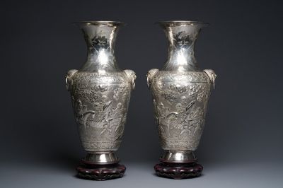 A pair of Chinese silver vases depicting 'Guo Ziyi's birthday', Qingyun 慶雲 mark, 19th C.