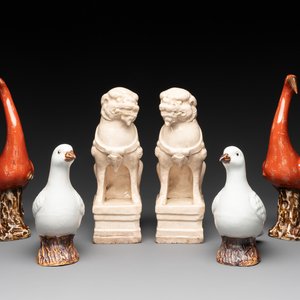 A pair of Chinese white-glazed Buddhist lions, a pair of doves and a pair of iron-red-decorated cranes, Ming and later — photo 1