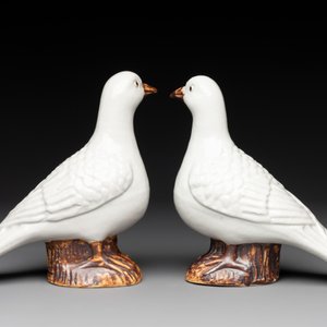 A pair of Chinese white-glazed Buddhist lions, a pair of doves and a pair of iron-red-decorated cranes, Ming and later — photo 15