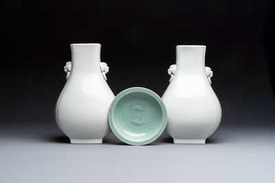 A pair of Chinese white-glazed 'Hu' vases and a Longquan celadon 'Twin Fish' plate, 20th C.