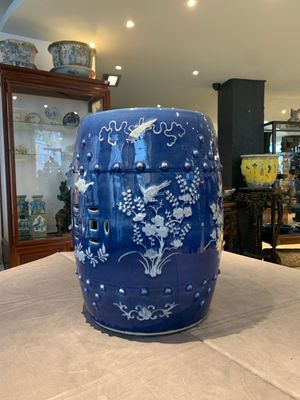 A pair of Chinese white slip-decorated blue-ground garden seats, 19th C. — photo 1