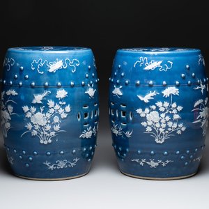 A pair of Chinese white slip-decorated blue-ground garden seats, 19th C. — photo 1