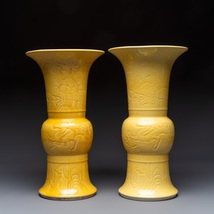 A pair of Chinese yellow-glazed 'Gu' vases with incised chilongs and landscapes, Chenghua mark, 20th C. — photo 2