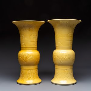 A pair of Chinese yellow-glazed 'Gu' vases with incised chilongs and landscapes, Chenghua mark, 20th C. — photo 3