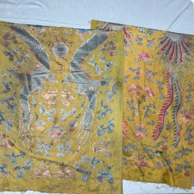 A pair of Chinese yellow-ground embroidered 'Dragons' and 'Phoenixes' panels — photo 1