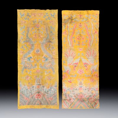 A pair of Chinese yellow-ground embroidered 'Dragons' and 'Phoenixes' panels, 19th C.