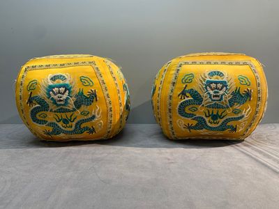 A pair of Chinese yellow-ground embroidered silk 'dragon' cushions, 19th C. — photo 1