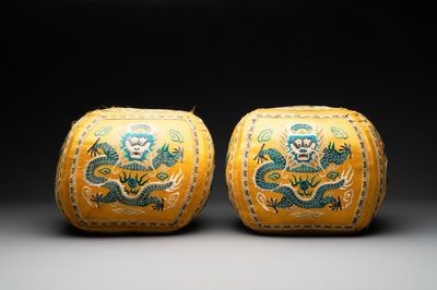 A pair of Chinese yellow-ground embroidered silk 'dragon' cushions, 19th C.