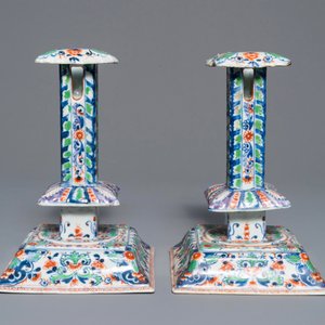 A pair of clobbered Chinese blue and white candlesticks, Kangxi — photo 2