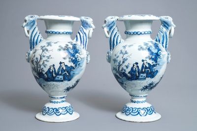 A pair of Dutch Delft blue and white chinoiserie alter vases, late 17th C.