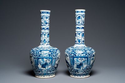 A pair of Dutch Delft blue and white chinoiserie bottle vases, 18th C.