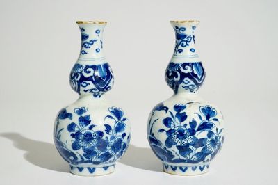 A pair of Dutch Delft blue and white double gourd vases, 1st quarter 18th C.