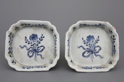 A pair of Dutch Delft blue and white flower holder stands, 18th C.