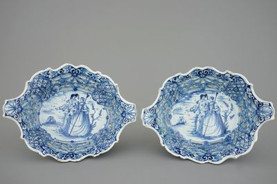 A pair of Dutch Delft blue and white openworked baskets, 18th C.