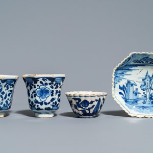 A pair of Dutch Delft blue and white plates, three cups and a saucer, 18th C. — photo 5