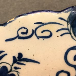 A pair of Dutch Delft blue and white "Tea Tree" dishes and a dish with a flower basket, 18th C. — photo 7