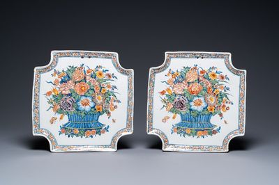 A pair of exceptionally fine polychrome Dutch Delft flower basket plaques, 18th C.