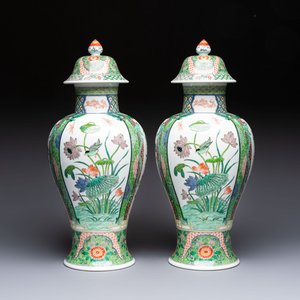 A pair of famille verte-style 'Lotus Pond and Flower Basket' vases and covers, Samson, Paris, 19th C. — photo 1