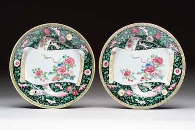 A pair of fine Chinese famille rose black-ground 'scrolls and flowers' plates, Yongzheng/Qianlong