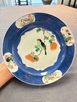 A pair of fine Chinese famille verte powder-blue-ground 'bird on branch' plates, Kangxi — photo 1