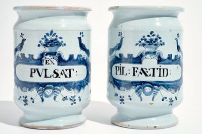 A pair of French faience Delft style albarello drug jars, Lille, 18th C.