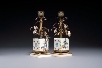 A pair of gilt silver and metal candlesticks with Chinese porcelain, European porcelain flowers, and marble bases, marked Boin-Taburet, late 19th C.