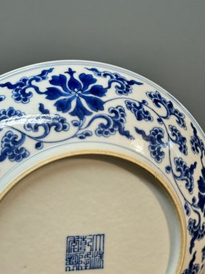 A pair of imperial Chinese blue and white 'lotus scroll' plates, Qianlong mark and of the period — photo 14