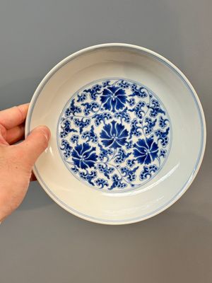 A pair of imperial Chinese blue and white 'lotus scroll' plates, Qianlong mark and of the period — photo 17