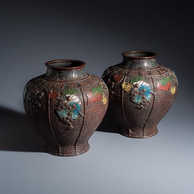 A pair of inscribed Japanese bronze champlevé vases, Meiji, 19th C.