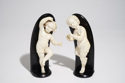 A pair of ivory models of putti, France, 18th C.