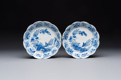 A pair of Japanese Arita blue and white 'Birds among Flowering Branches' plates, Edo 18th C.