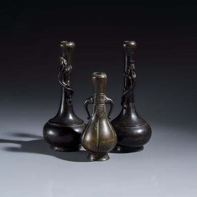 A pair of Japanese bronze 'Chilong' garlic-mouth vases and a bronze vase with handles, Meiji, 19th C.