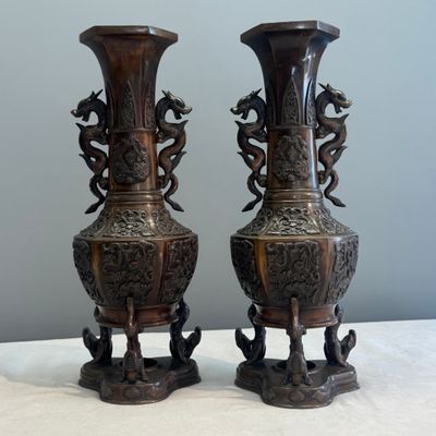 A pair of Japanese bronze vases with dragon-form handles — photo 1