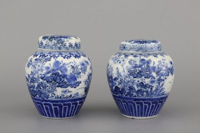 A pair of Japanese porcelain blue and white Arita jars and covers, 19th C.