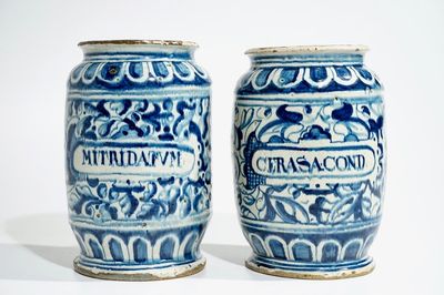 A pair of large blue and white Antwerp maiolica "A foglie" albarelli, 16th C.