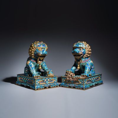 A pair of large Chinese cloisonné Buddhist lions, 20th C.