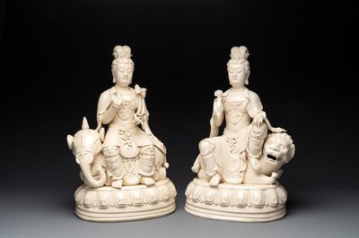 A pair of large Chinese Dehua blanc de Chine Bodhisattvas seated on an elephant and a Buddhist lion, 20th C.