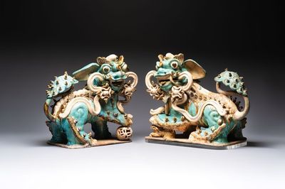 A pair of large Chinese polychrome-glazed Shiwan stoneware Buddhist lions, 19th C.