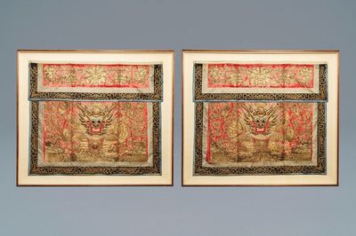 A pair of large Chinese relief-embroidered silk 'dragon' panels, 19th C.