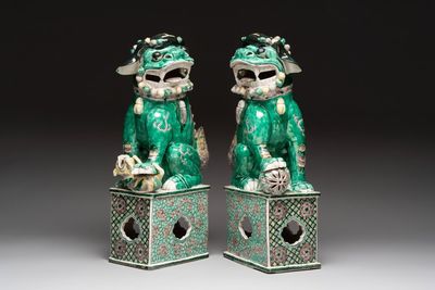 A pair of large Chinese verte biscuit Buddhist lions, 19th C.