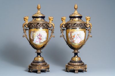 A pair of large French Sèvres-style vases with gilded bronze mounts, signed Le Berre, 19th C.