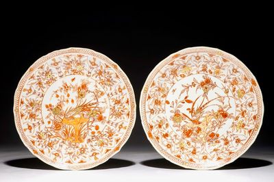 A pair of moulded Chinese iron red and gilt plates with pheasants, Kangxi