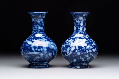 A pair of Nevers white-splashed blue-ground 'à la bougie' vases, France, late 17th C.
