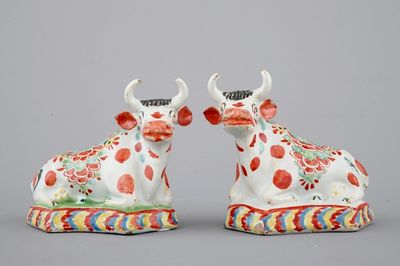 A pair of petit feu polychrome Dutch Delft cows, 18th C.