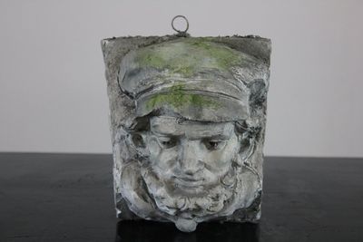 A pair of plaster casts of heads, workshop De Wispelaere, Bruges, 1st half 20th C.
