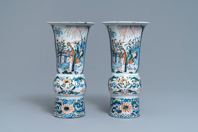 A pair of polychrome Dutch Delft chinoiserie beaker vases, 18th C.