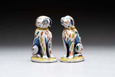 A pair of polychrome Dutch Delft dogs, 18th C.