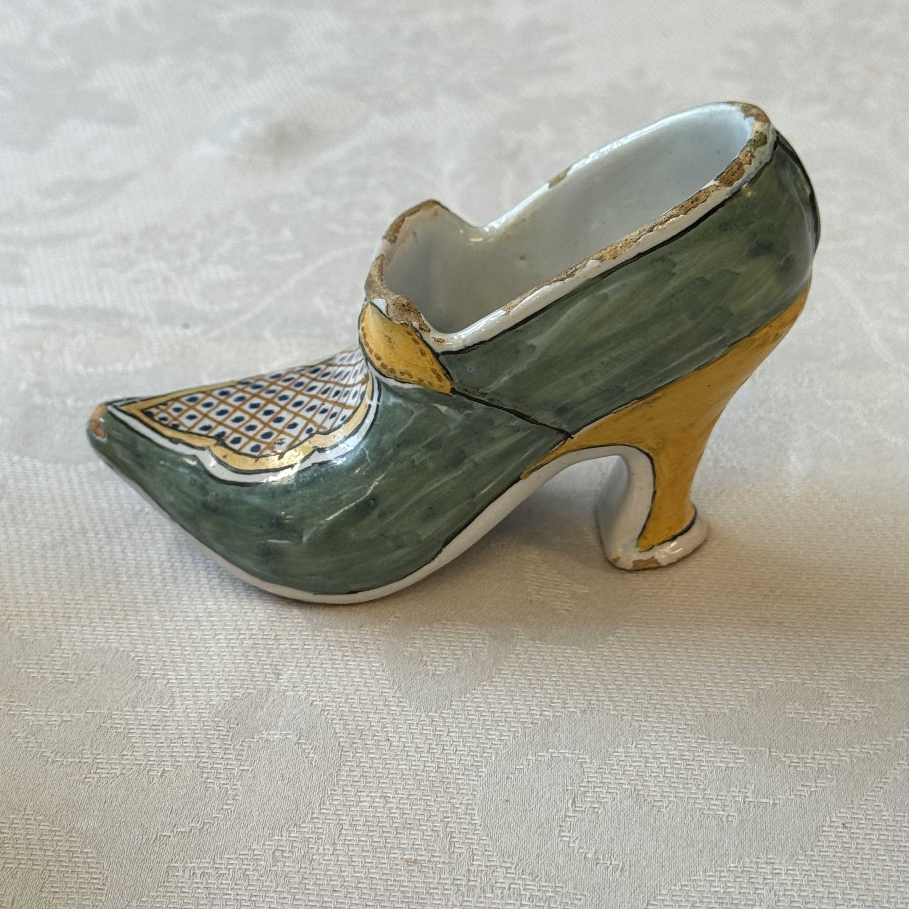 A pair of polychrome Dutch Delft models of shoes — photo 9