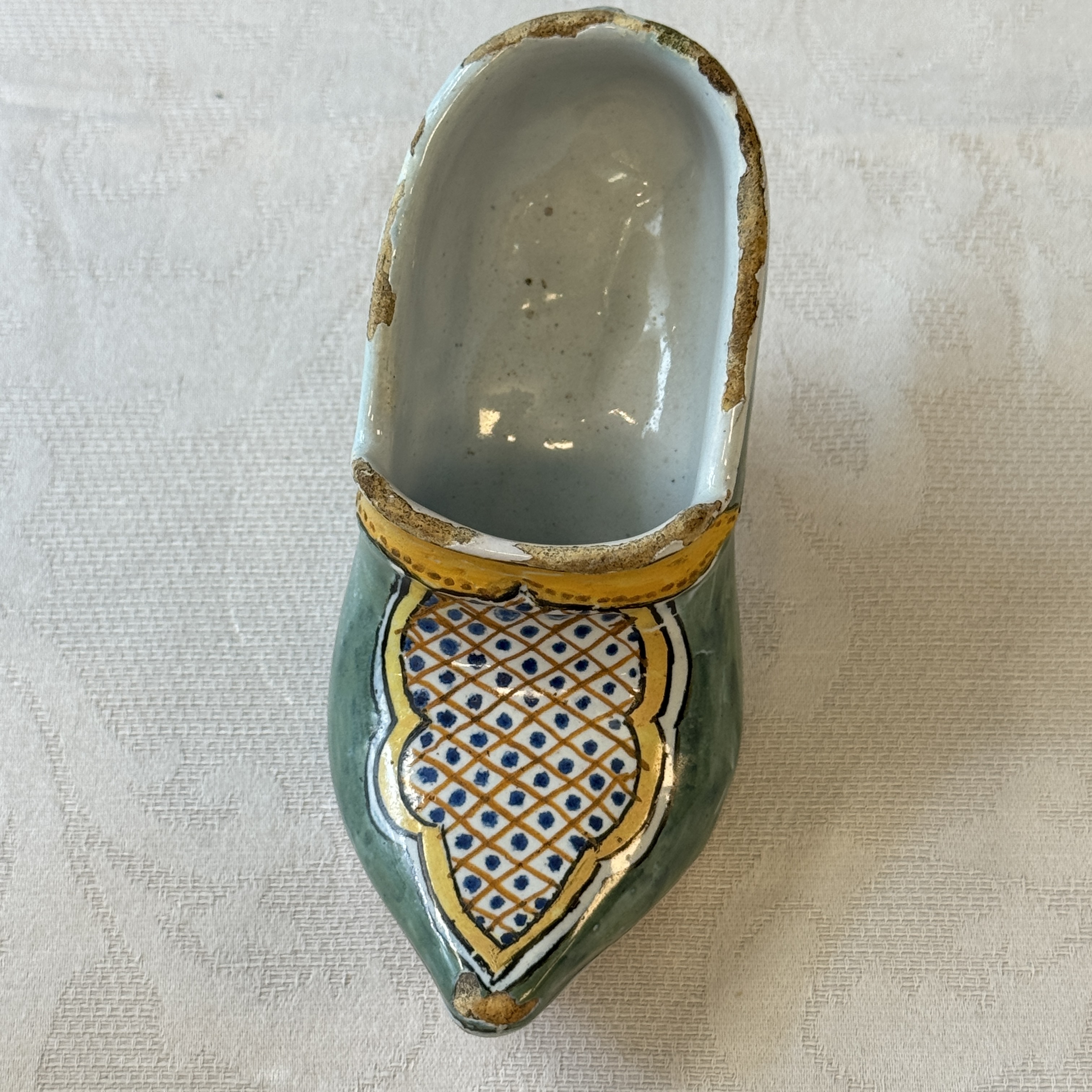 A pair of polychrome Dutch Delft models of shoes — photo 12