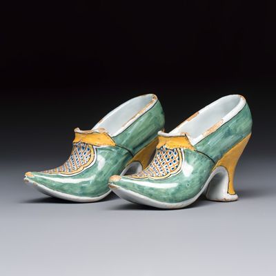 A pair of polychrome Dutch Delft models of shoes, 18th C.